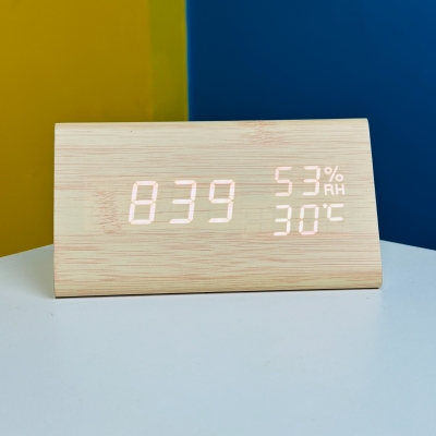 Wooden digital electronic alarm clock triangle wooden clock creative voice control LED can display temperature and humidity (WHITE)